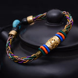 Bracelet tibétain porte bonheur 8 brins - Univers Tibet